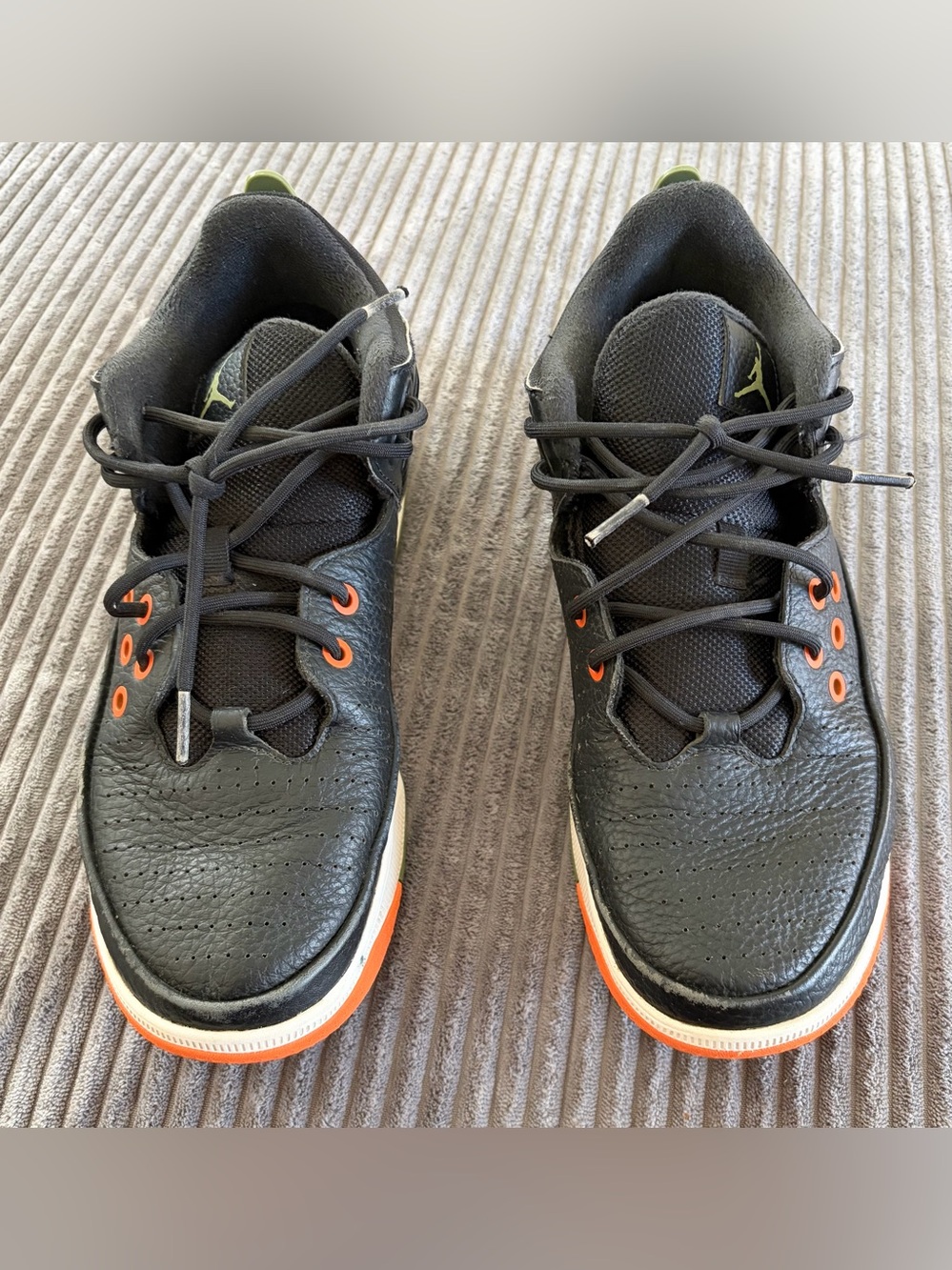 Jordan Black Sneakers with Orange Accents